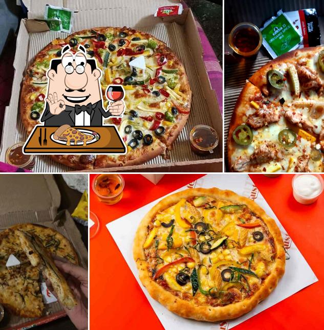 At Gusteaus Pizza, you can get pizza