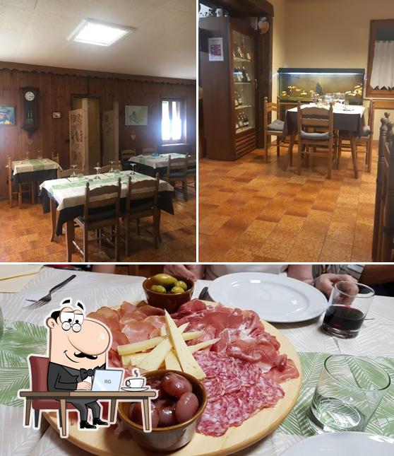 Tra le diverse cose da Ristorante Osteria Da Nice si possono trovare la interni e tavolo da pranzo