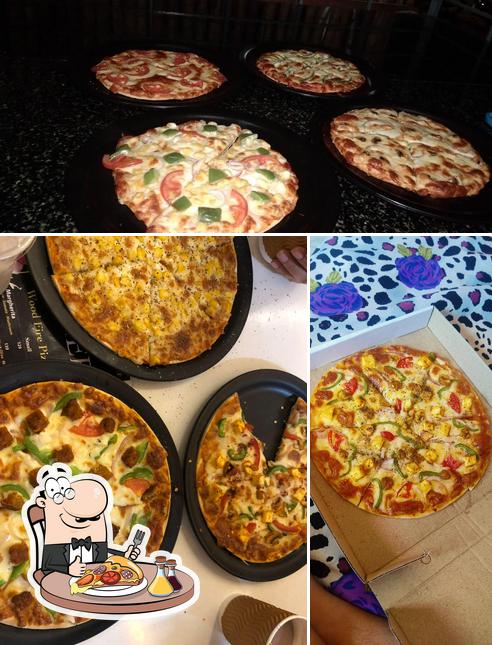 Pick pizza at San's Deli - Cafe & Woodfire Pizza