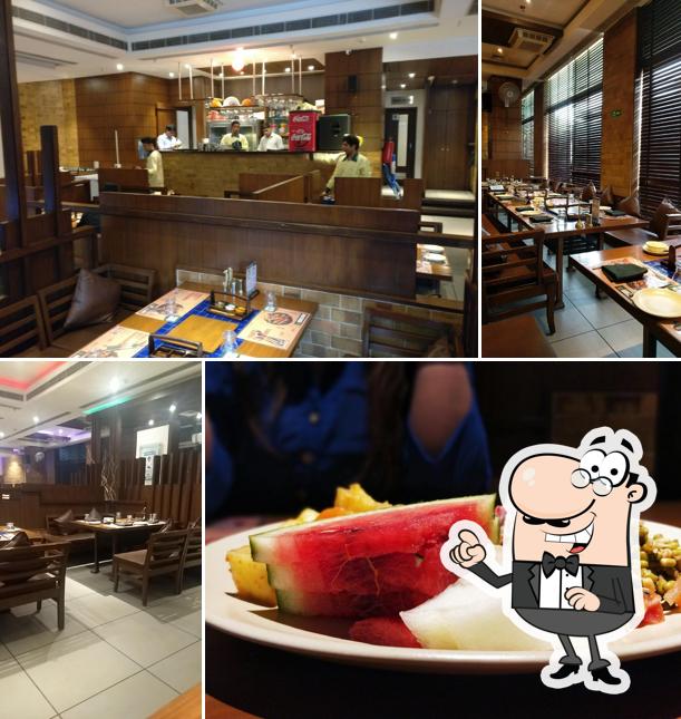 Take a seat at one of the tables at Barbeque Nation