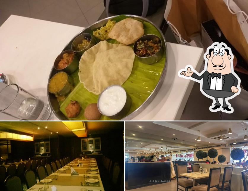 This is the image depicting interior and food at Minerva Grand Restaurant