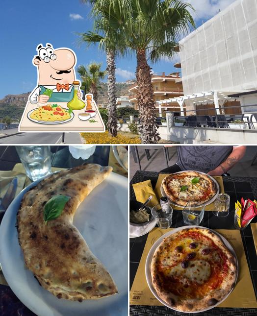 Dai un’occhiata alla foto che presenta la cibo e esterno di Pizzeria Papillon