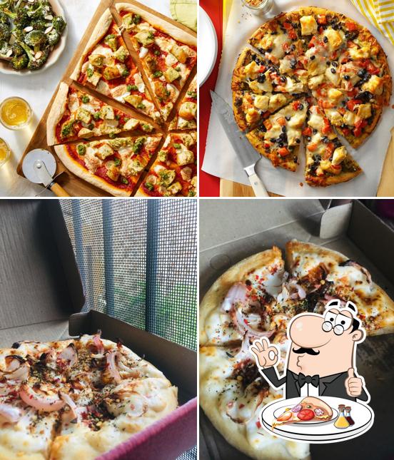 Get pizza at Redinnox Pizza Rohtak