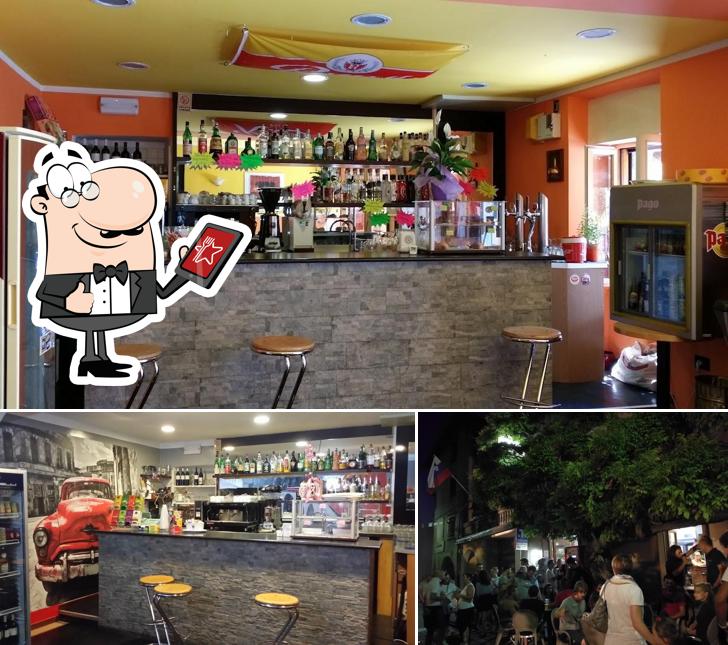 Puoi goderti l'aria fresca da seduto all'esterno di BAR Glicine tabaccheria