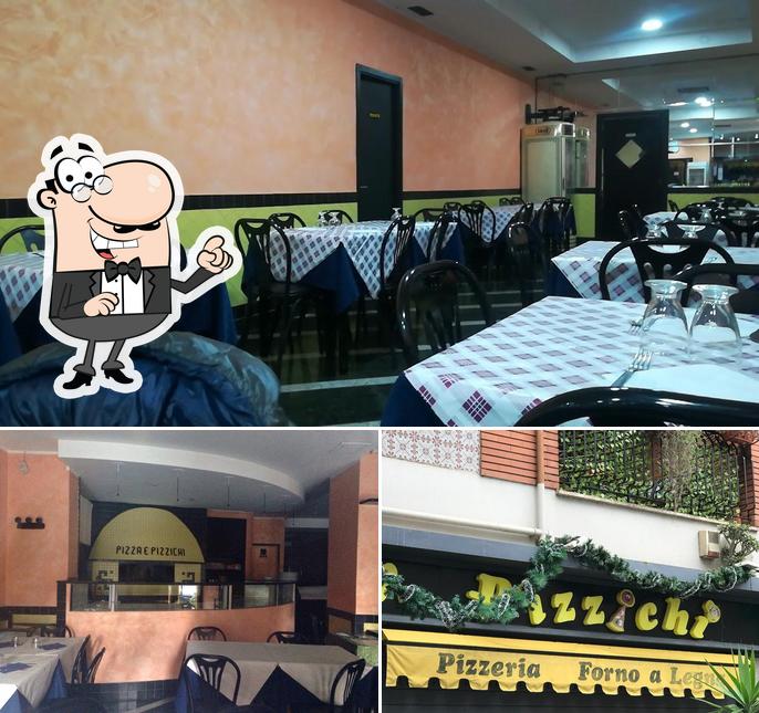 Dai un'occhiata agli interni di Pizza e Pizzichi