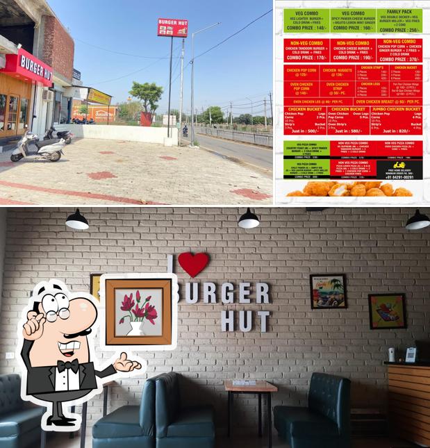 Take a seat at one of the tables at BURGER HUT