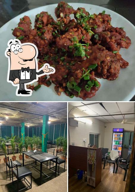 Take a look at the image depicting interior and food at Surya Family Restaurant