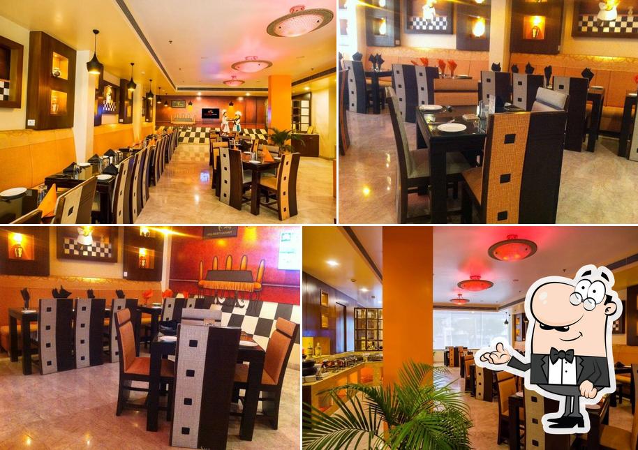 Take a seat at one of the tables at My Chef