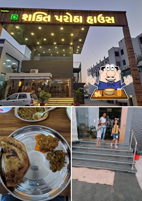 The photo of Shakti parotha house’s food and exterior