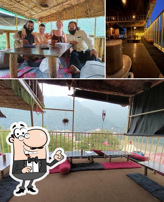 Check out the image showing exterior and dining table at Sohum Cafe
