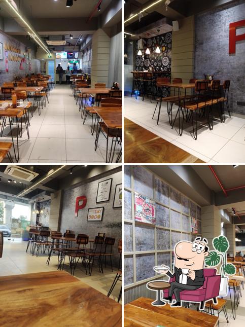 Take a seat at one of the tables at La Pino'z Pizza