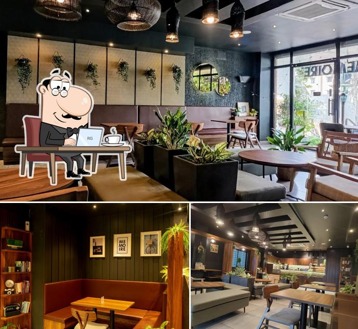 Take a seat at one of the tables at Café Memoire