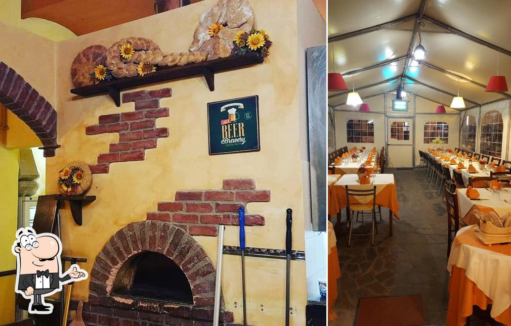 Siediti a un tavolo di Pizzeria Bella Napoli