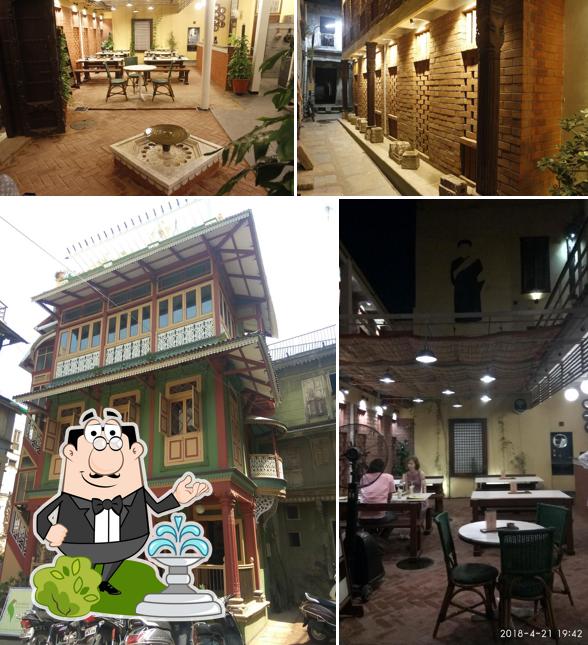 The photo of exterior and dining table at Pol Kholi