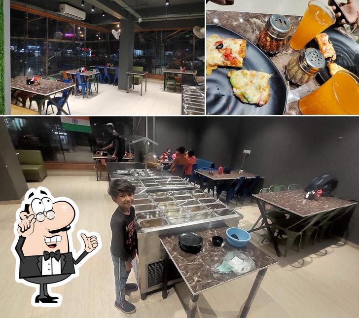 The image of Olinoz Pizza and unlimited’s interior and beverage