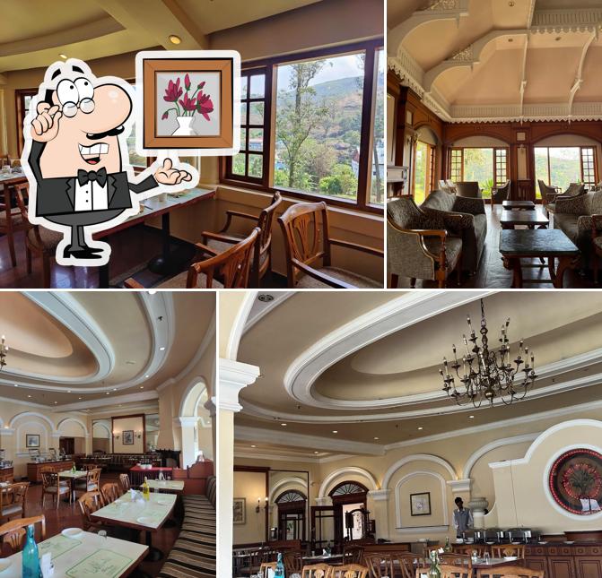 Take a seat at one of the tables at KTDC Restaurant Munnar (Multi Cuisine), Tea County KTDC Ktd