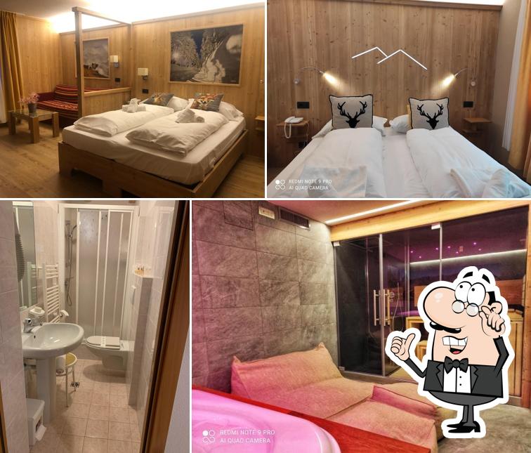 Siediti a un tavolo di Alps Oriental Wellness Hotel