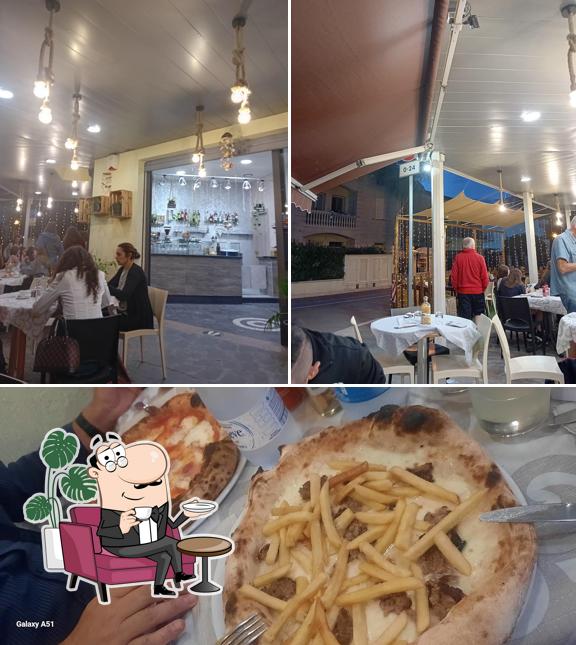 Guarda la immagine che mostra la interni e seo_images_cat_60 di Al 23 Ristorante Pizzeria
