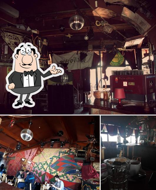 La immagine della interni e bancone da bar di Masters Club