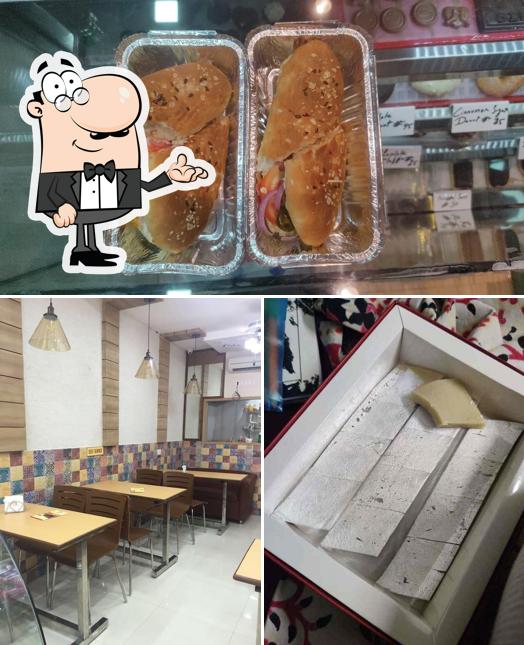 This is the picture showing interior and food at Donut Bakery Cafe