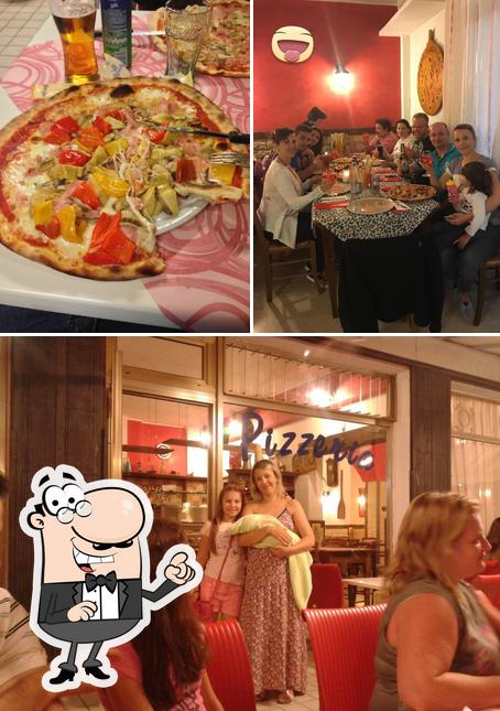 La foto della interni e pizza di Pizza House Cafe'