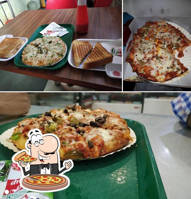 Try out pizza at Symco Modern Bakers Cake& Sweet Shop