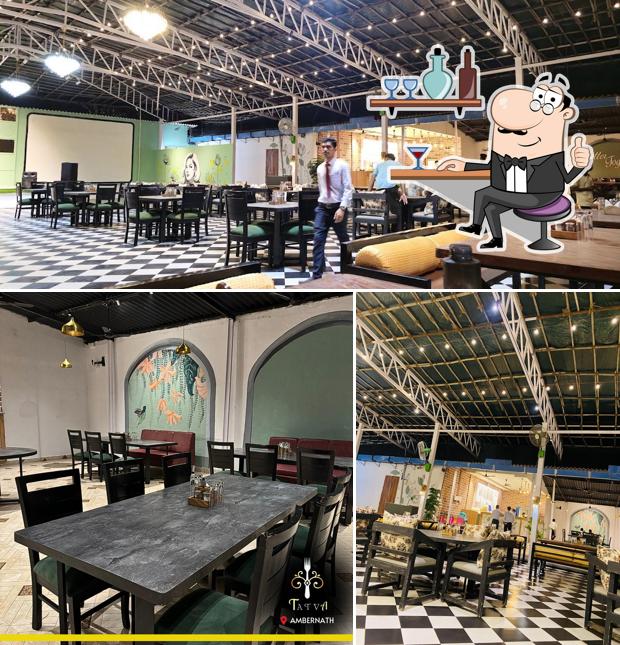 Take a seat at one of the tables at Tatva The Family Dining Bar