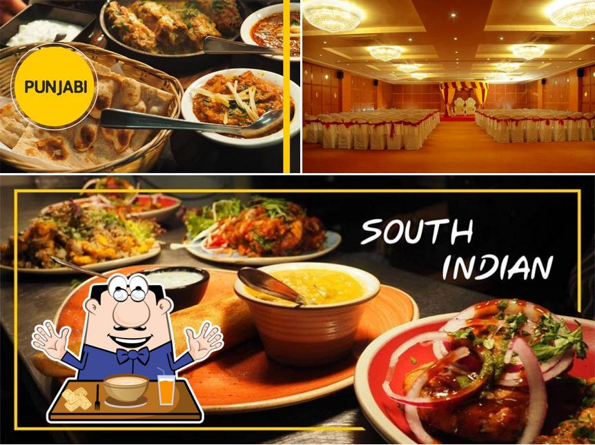Among different things one can find food and interior at Hotel Silver Sand, Rajkot