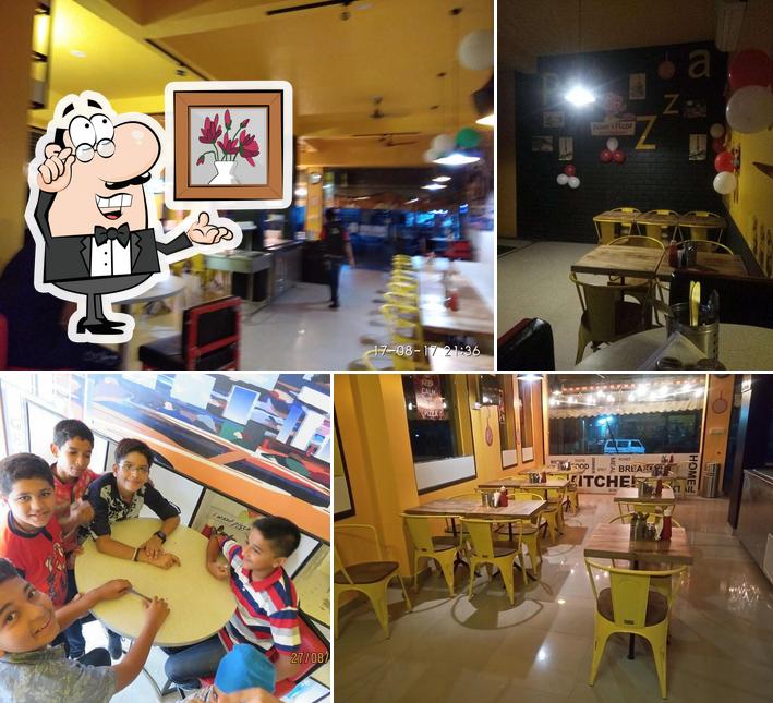 Take a seat at one of the tables at Mr.Bean's Pizza