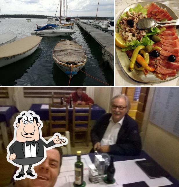 Siediti a un tavolo di Konoba Ladici