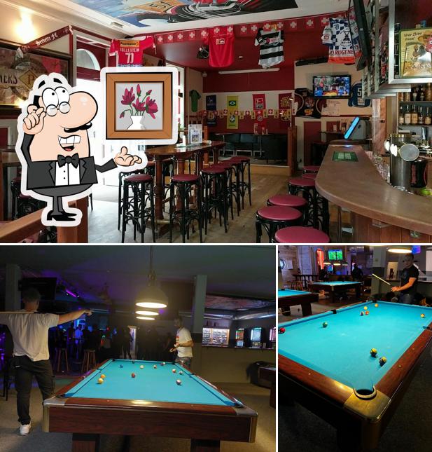 Dai un'occhiata agli interni di Helvetia Sport Bar Interlaken