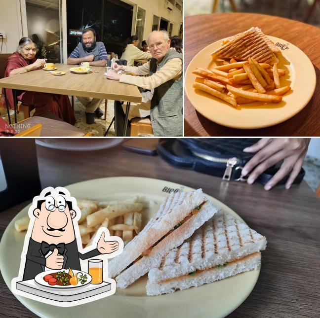 The image of food and dining table at Big Cup Cafe Mysuru