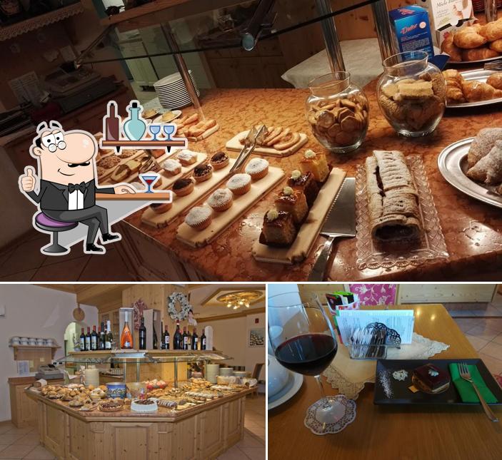 Siediti a un tavolo di Ristorante Pineta