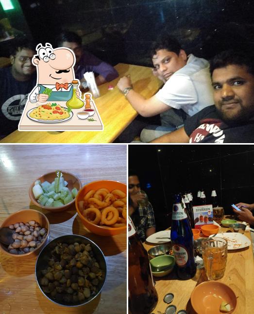 The image of food and bar counter at Tavern Bar
