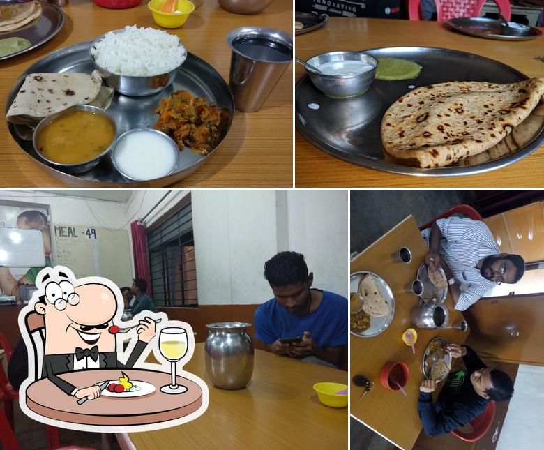 This is the picture depicting food and interior at Aklu Mess