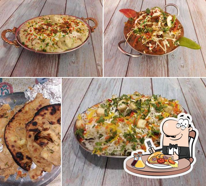 Pick pizza at Apna Family Restaurant