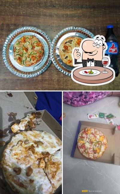 This is the picture showing food and beverage at Amazing Super Delicious Cheese Pizza