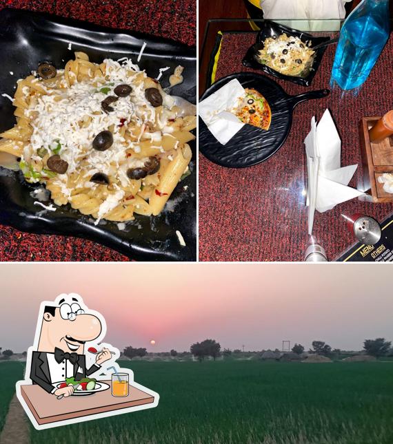 This is the image depicting food and exterior at The God father cafe
