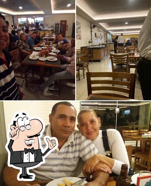Sente em uma das mesas no Pizzaria Zebu Rodízio de Pizzas e Massas