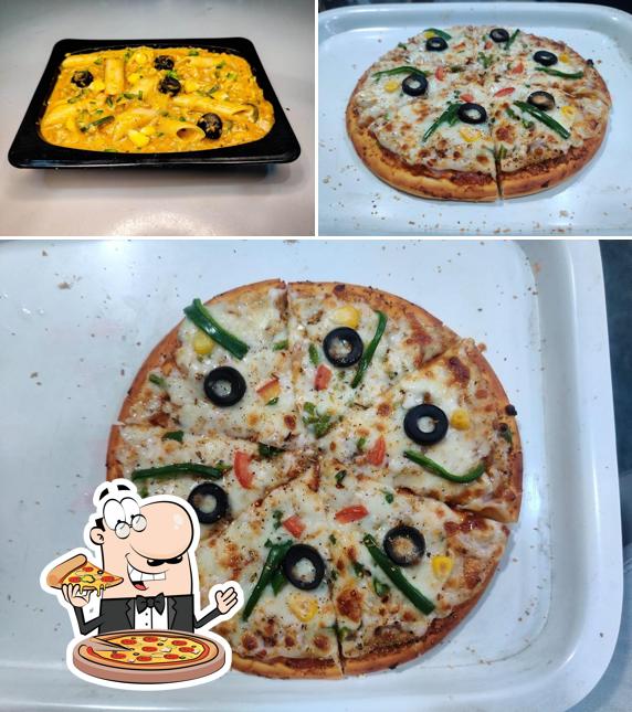 Try out pizza at Divine Shakes