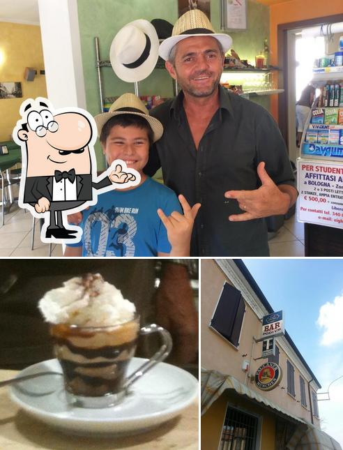 Guarda la immagine che raffigura la interni e dolce di Bar Podivm