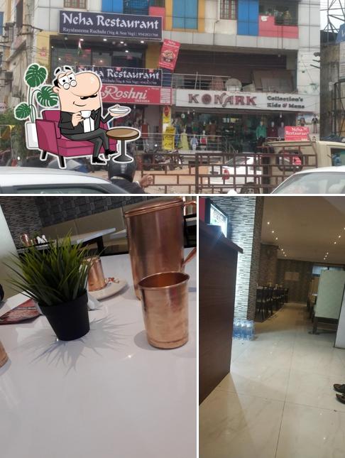 The image of Neha Restaurant’s interior and exterior