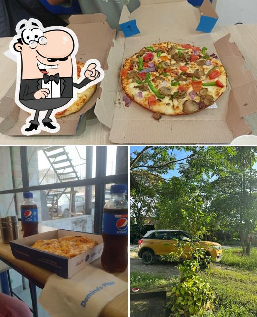 Among various things one can find exterior and pizza at Domino's Pizza A- Sector, Naharlagun