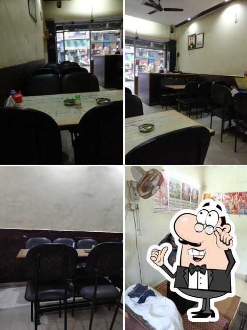 Take a seat at one of the tables at Sammaan veg. Restaurant