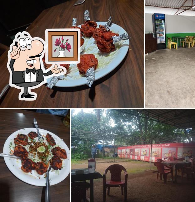 Take a seat at one of the tables at Vaibhav Hotel