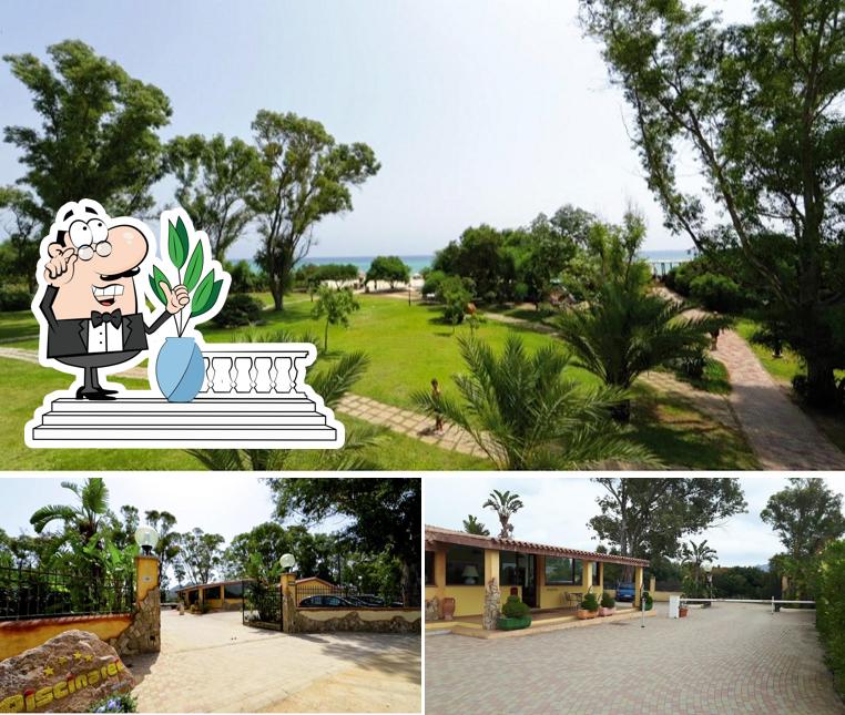 Goditi la vista dall'area esterna di Piscina Rei Village