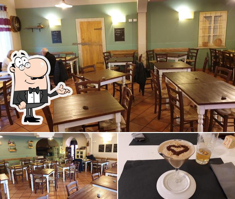 La immagine della interni e bevanda di Antica Osteria Del Ponte