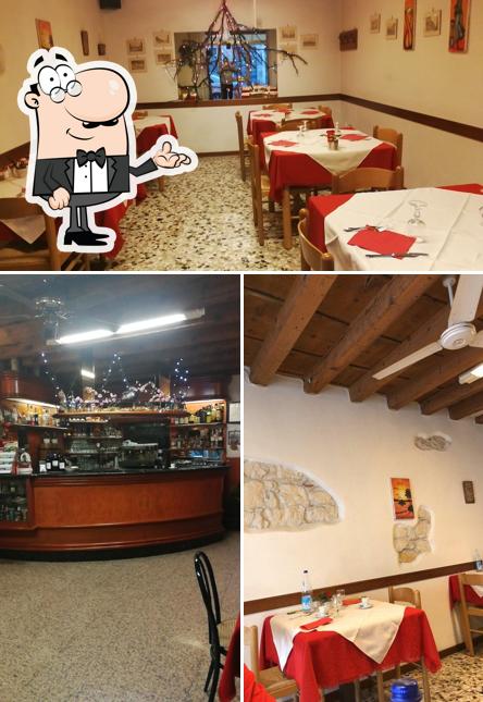 Dai un'occhiata agli interni di Trattoria Aurora