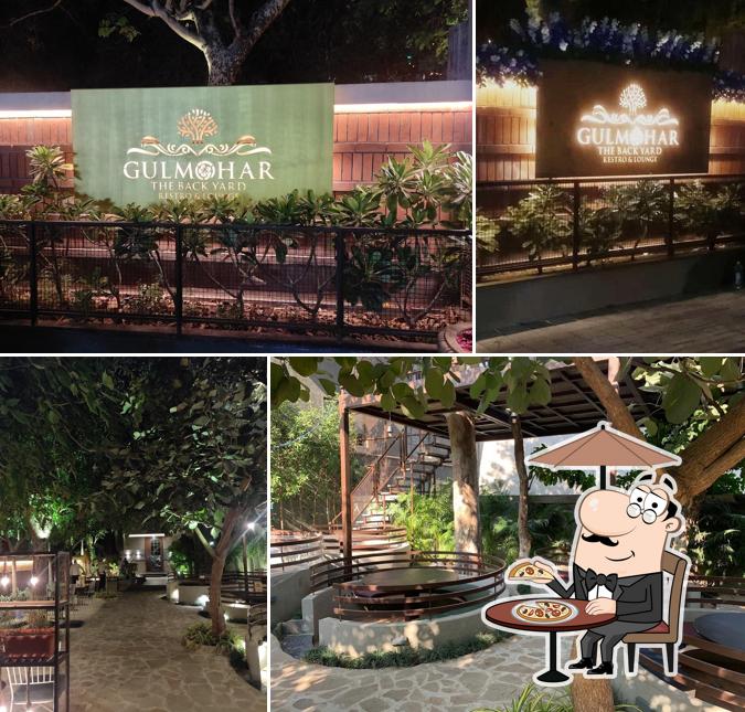 Enjoy the view outside Gulmohar Backyard, Restro and lounge