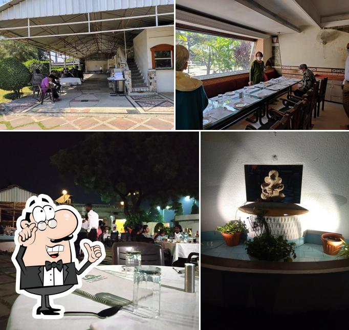 The photo of Highway Glory Restaurant’s interior and dining table